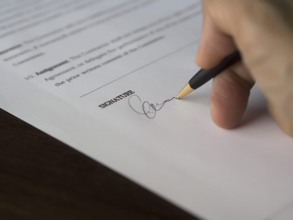 agreement signature business close up